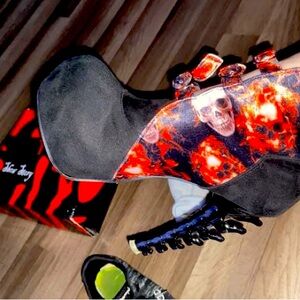 Love Story brand . Skull & flames heels. Never worn
